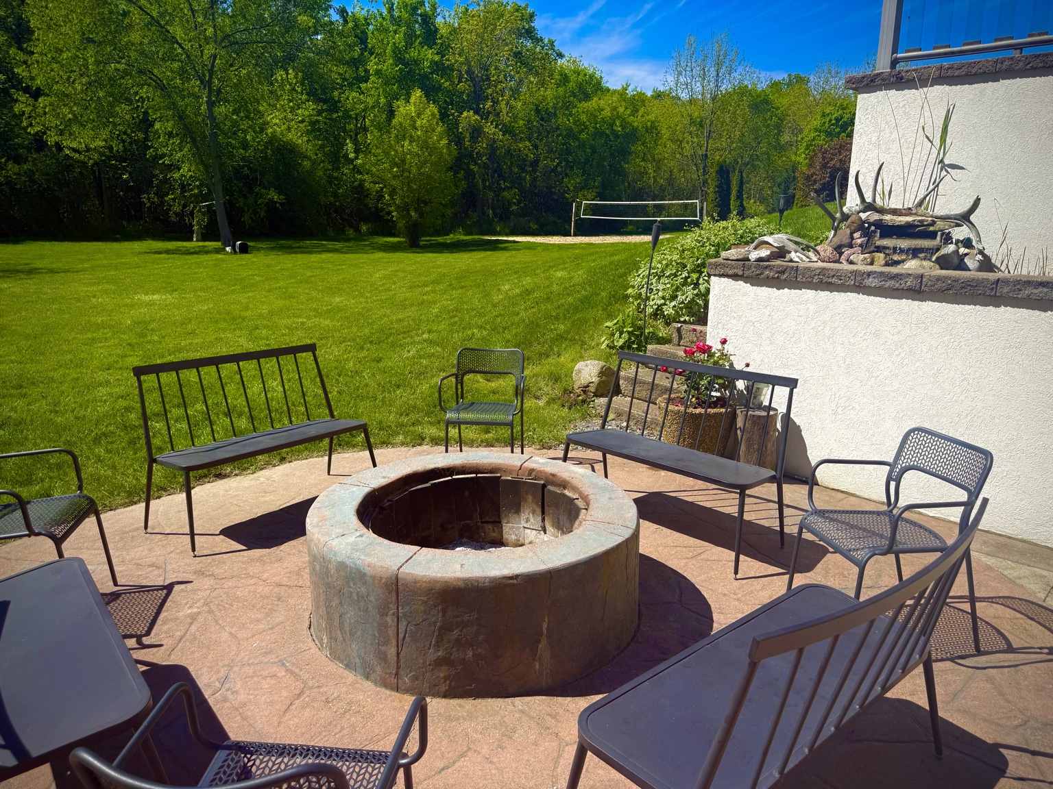 The Kumprey family’s backyard fire pit and gathering area